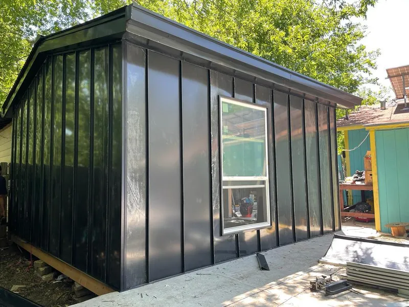 Black standing seam metal wall panels for Metal Roof Installation in Devils Lake