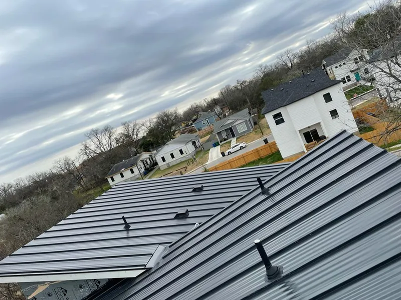 Standing seam metal roof panels with vents for Skylight Repair in Devils Lake